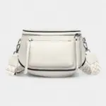 Lommebelteveske for kvinner i elegant skinn med frontlomme